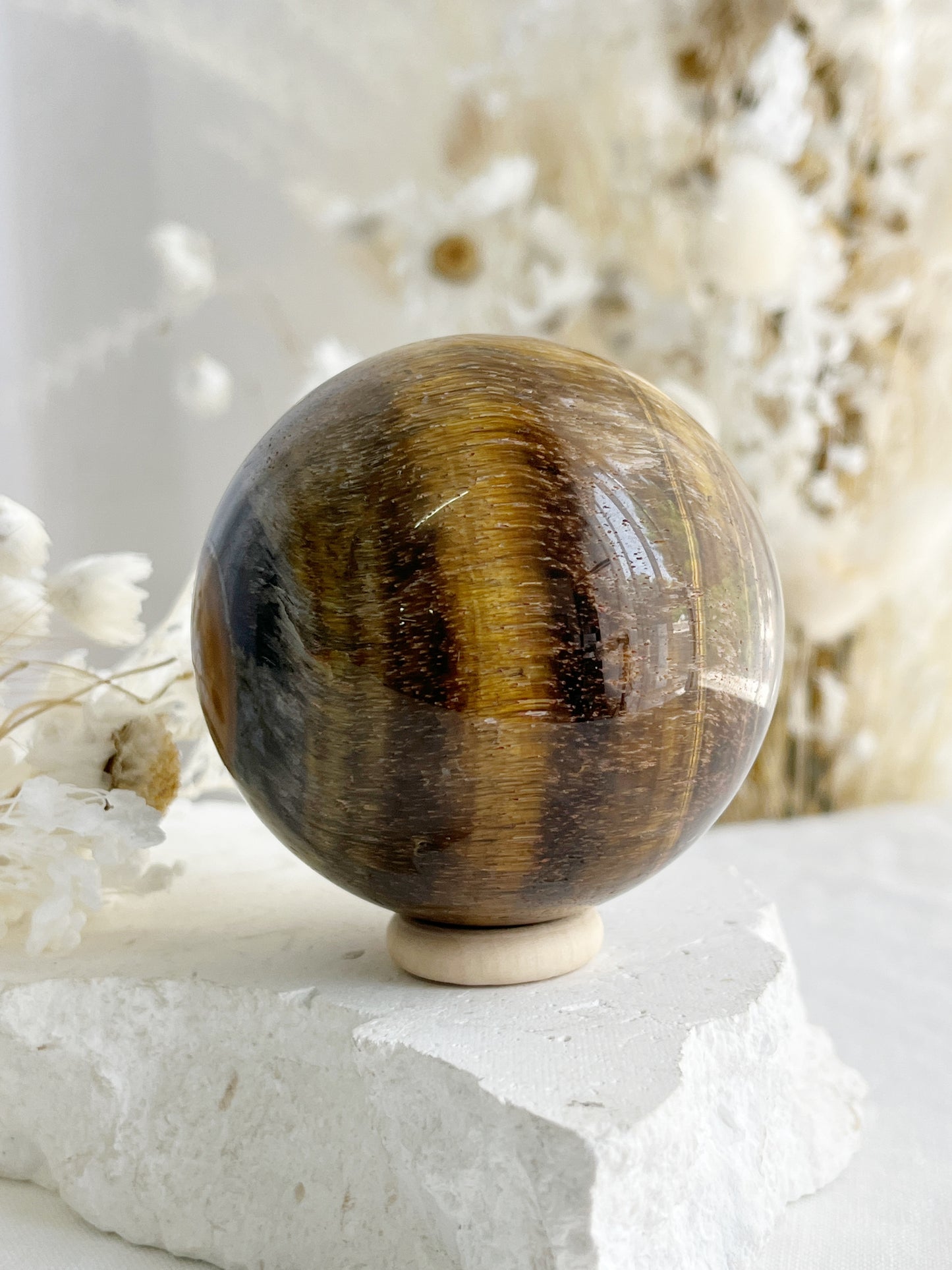 TIGERS EYE SPHERE APPROX 6.4CM. STONED AND SAGED AUSTRALIA.