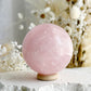 ROSE QUARTZ SPHERE APPROX 5.7CM. STONED AND SAGED AUSTRALIA.