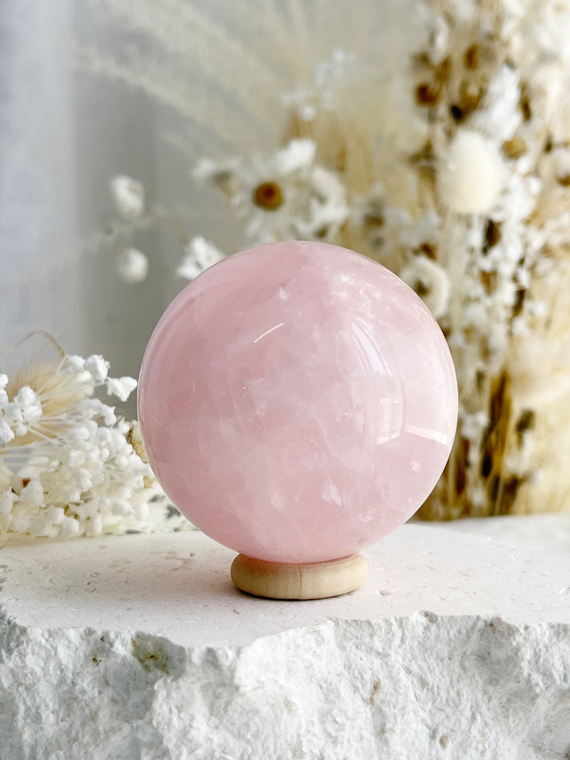 ROSE QUARTZ SPHERE APPROX 5.7CM. STONED AND SAGED AUSTRALIA.