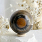 TIGERS EYE SPHERE APPROX 6.4CM. STONED AND SAGED AUSTRALIA.