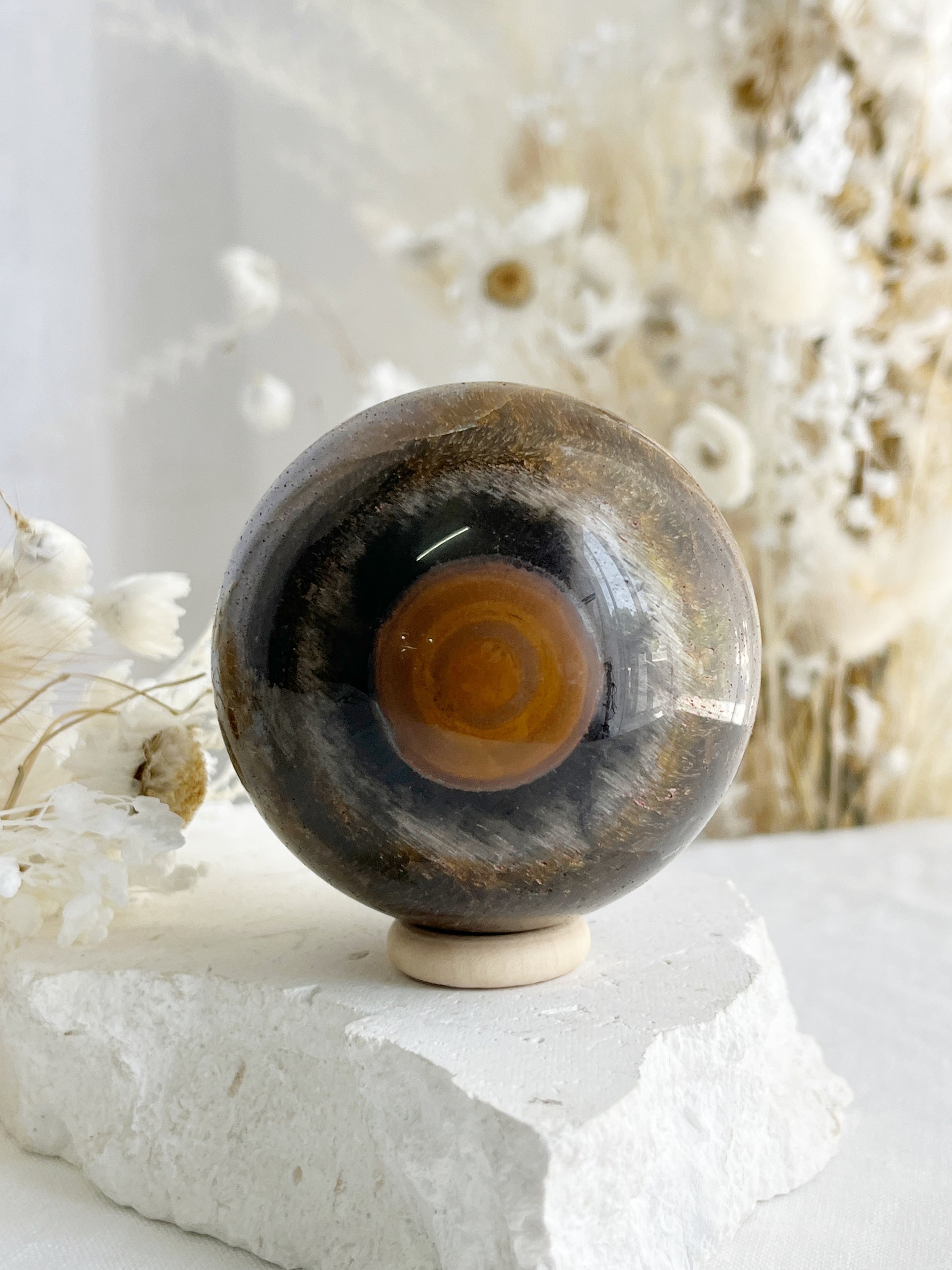 TIGERS EYE SPHERE APPROX 6.4CM. STONED AND SAGED AUSTRALIA.