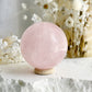 ROSE QUARTZ SPHERE APPROX 5.7CM. STONED AND SAGED AUSTRALIA.