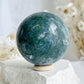 MOSS AGATE SPHERE APPROX 6.4CM. STONED AND SAGED AUSTRALIA.