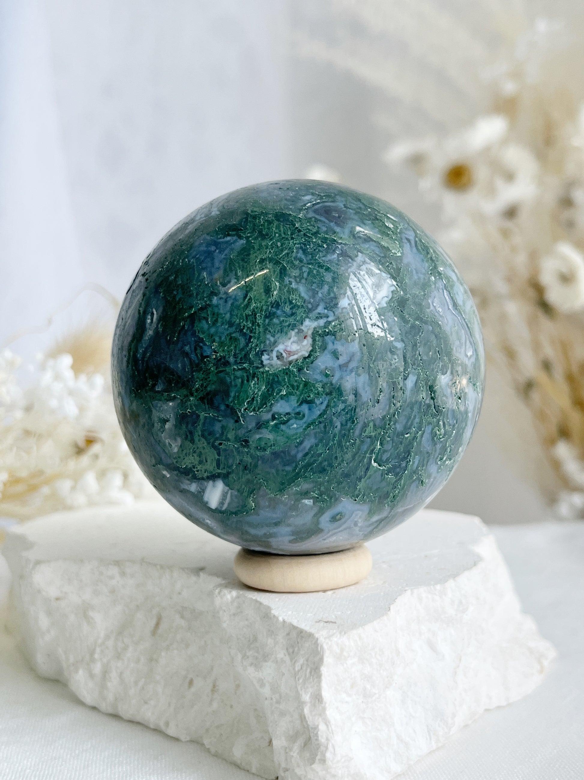 MOSS AGATE SPHERE APPROX 6.4CM. STONED AND SAGED AUSTRALIA.