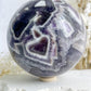 DREAM AMETHYST SPHERE APPROX 7.9CM. STONED AND SAGED AUSTRALIA.