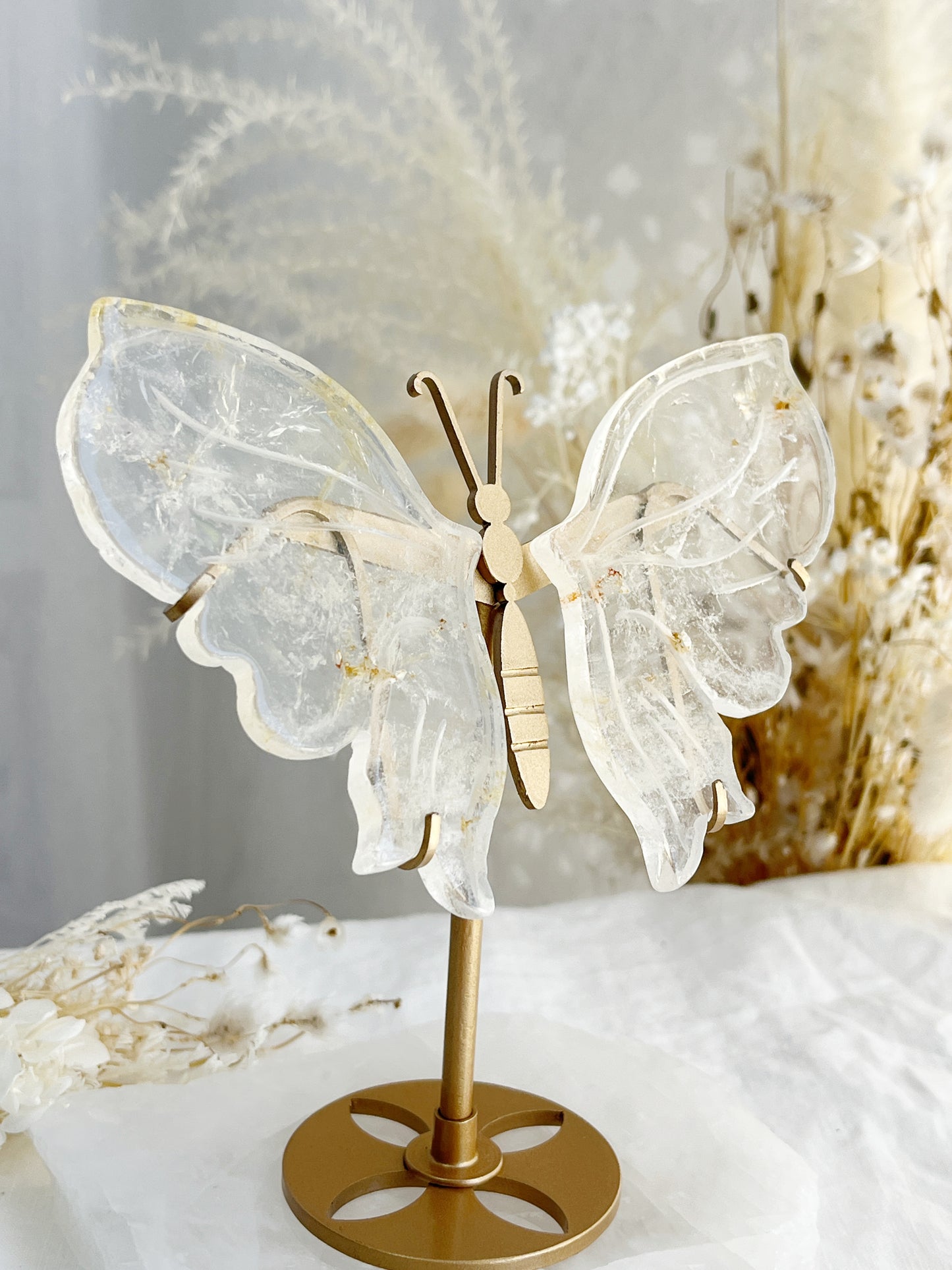Clear Quartz butterfly wings on gold stand with golden healer inclusions, Stoned and Saged crystal shop Australia