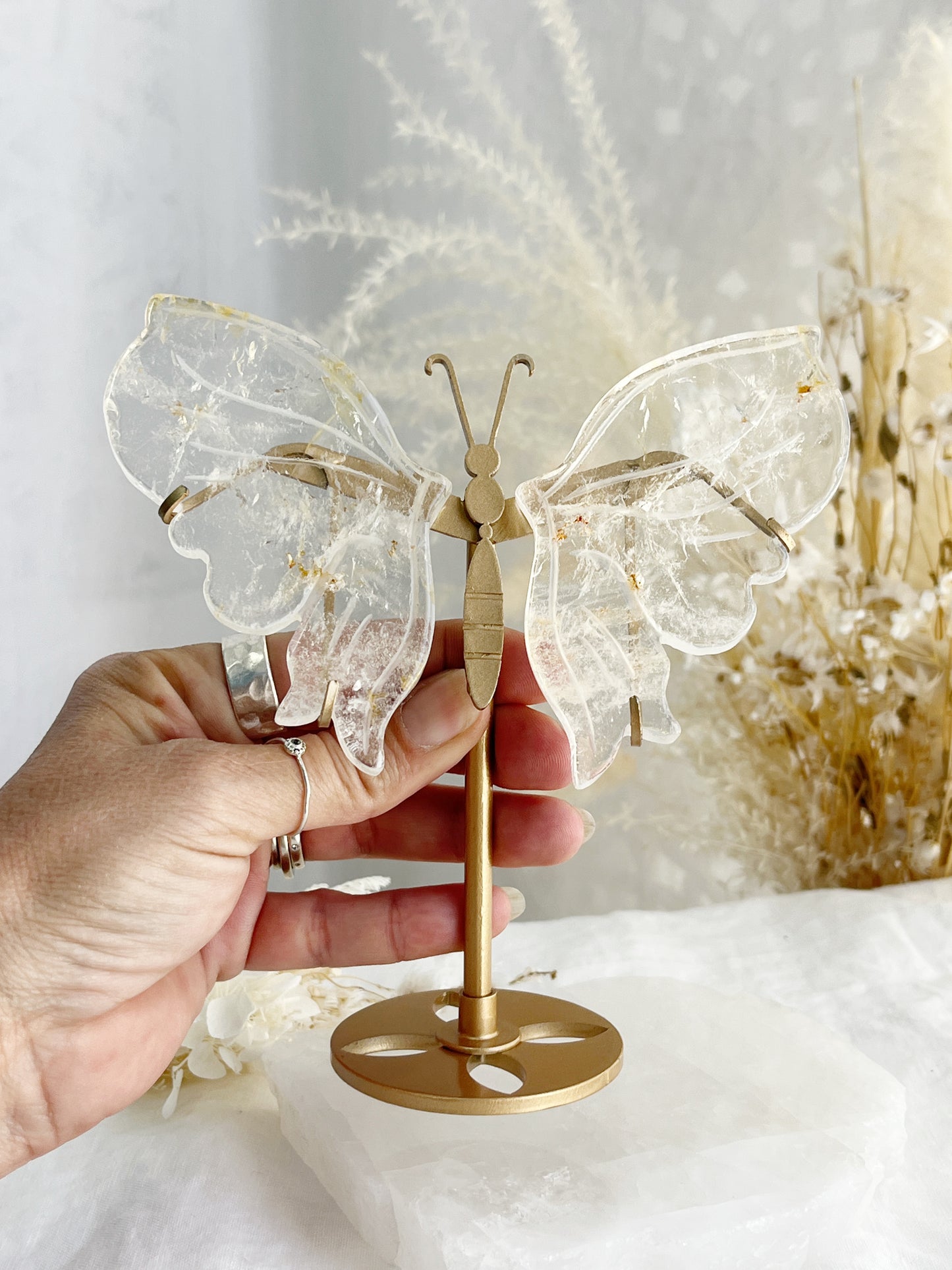 Clear Quartz butterfly wings on gold stand with golden healer inclusions, Stoned and Saged crystal shop Australia