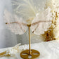 Rose Quartz angel wings on gold stand, Stoned and Saged crystal shop Australia
