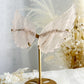 Rose Quartz angel wings on gold stand, Stoned and Saged crystal shop Australia