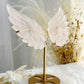 Rose Quartz angel wings on gold stand, Stoned and Saged crystal shop Australia