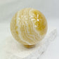 ORANGE CALCITE SPHERE, STONED AND SAGED AUSTRALIA